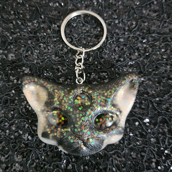 Resin 3 Eyed Cat Keychain - Black with Shifting Glitter and Orange Iridescent